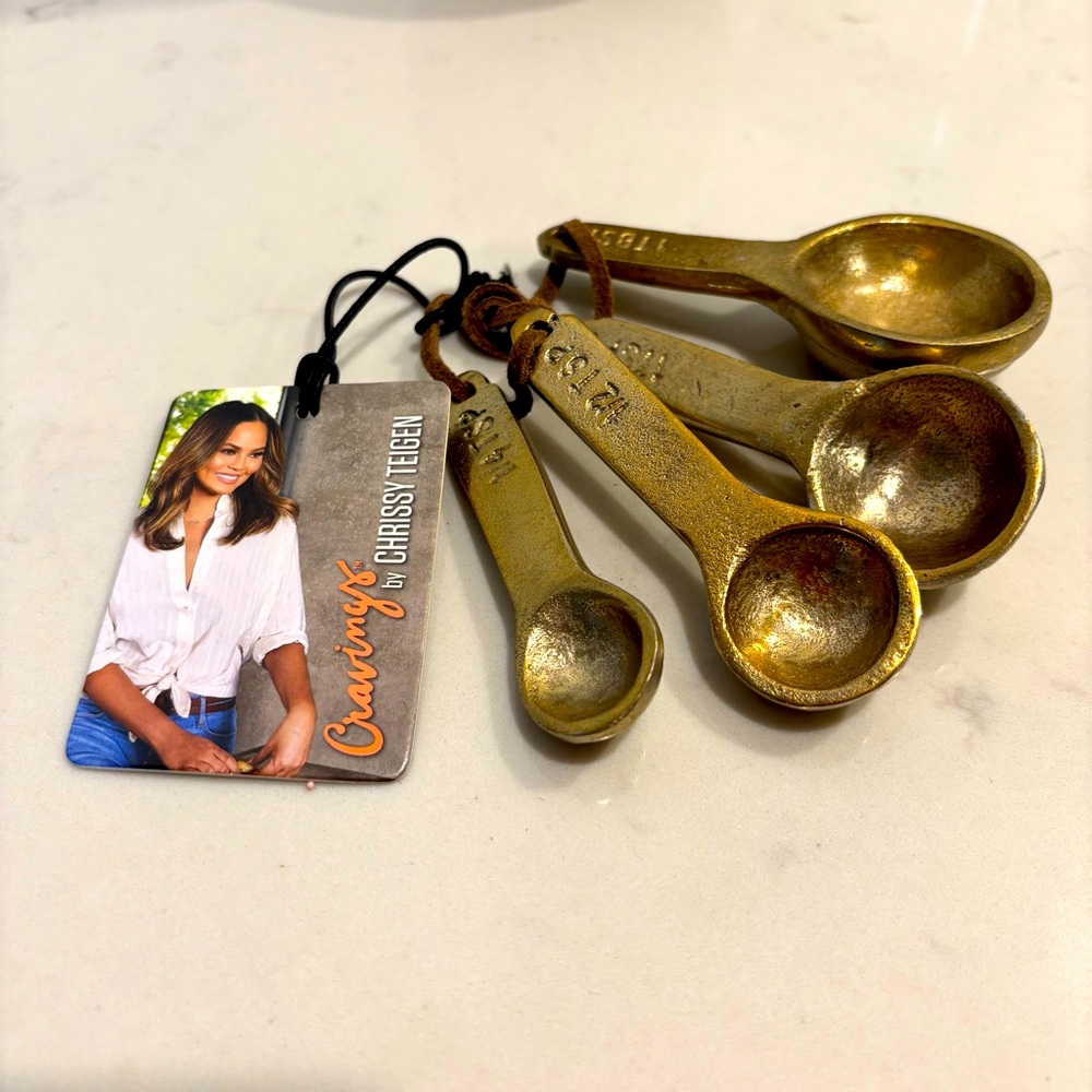 Gold tone vintage Measuring Spoon Set by Cravings Chrissy Teigen